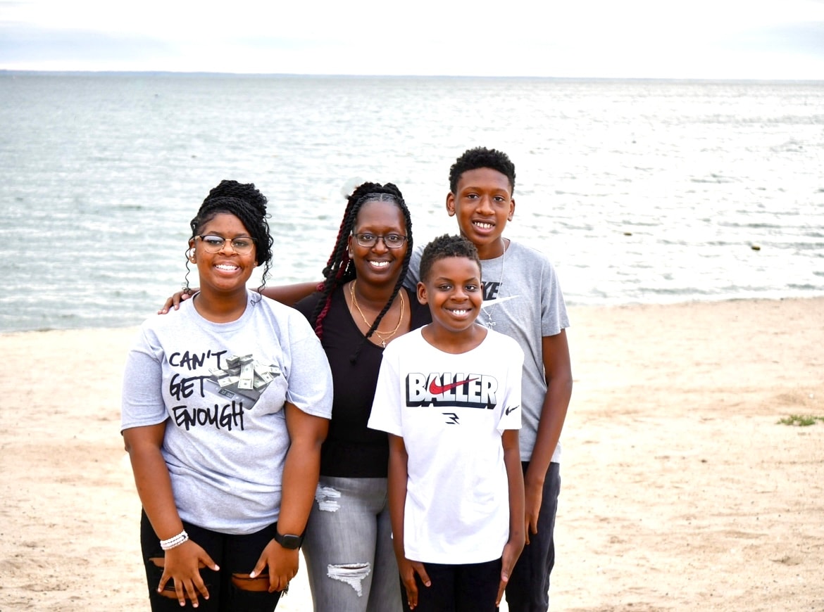 Anita Parker with her children on the beach