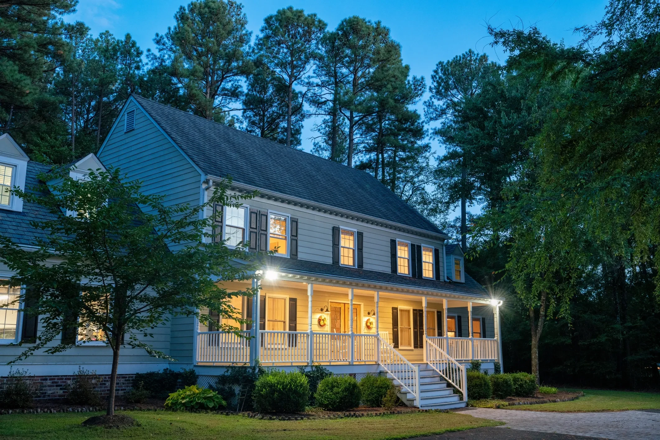Beautiful Hampton Roads home at dusk — the kind of home Anita helps clients find
